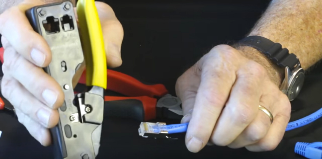 Insert connector into Tele-TitanXg crimp tool and terminate; Note: 10 gig connectors are not compatible with standard modular plug crimp tools. 